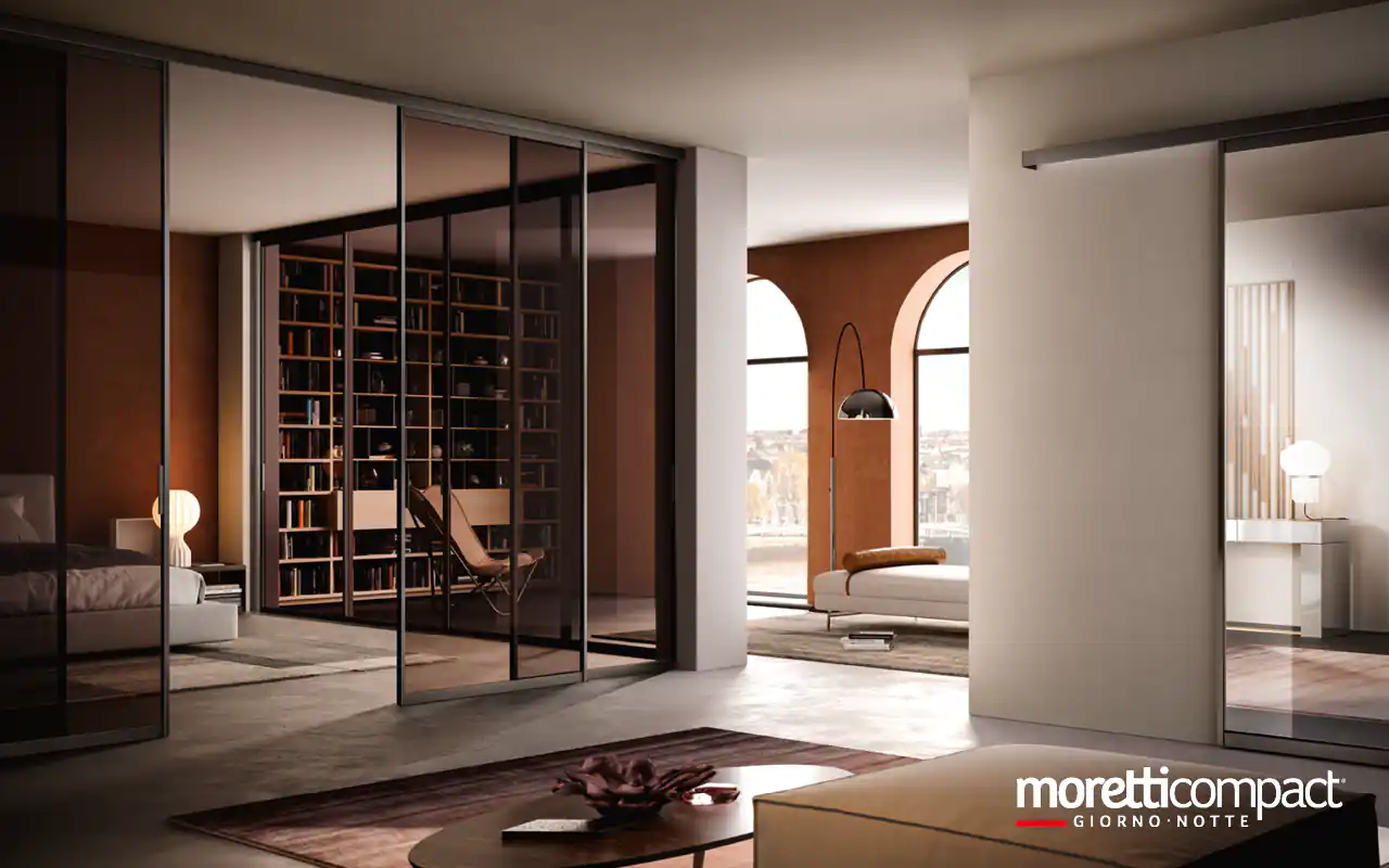 Portale in vetro con binari a soffitto