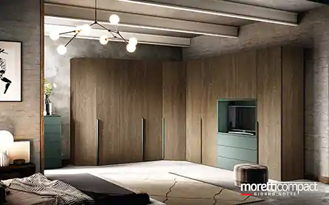 Armadio ad angolo con vano porta TV e cassettiera